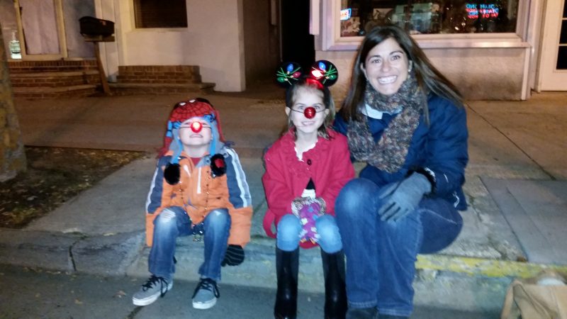 Beth Kukorlo, of Egg Harbor Township, enjoys the parade with her children John, 4, and Matisyn, 7.