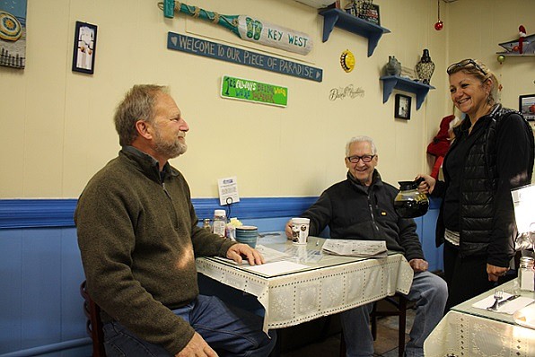 Event co-organizer Mike Lukens (left) with longtime friends and supporters Charlie Palermo and Arlene Stryker of Arlene's on Asbury. 