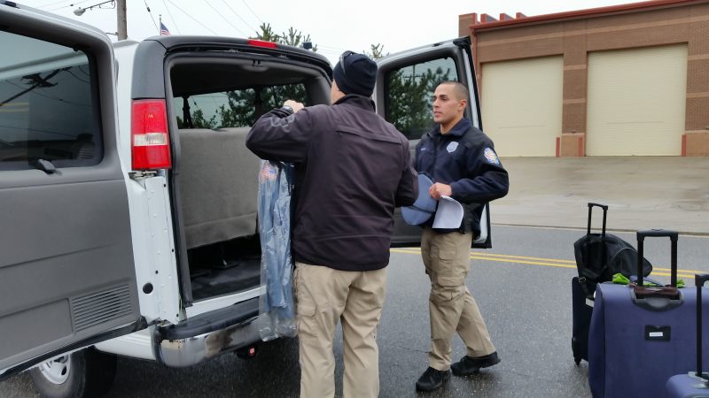 Officers packed their uniforms and other gear into a van for the trip to Washington.