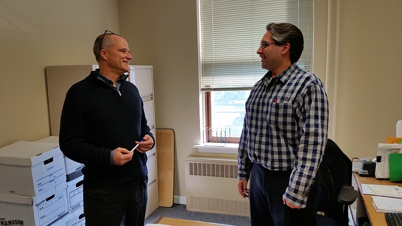 Von der Hayden, right, shares a laugh with the city's public information officer, Doug Bergen.