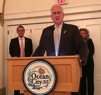 Cape May County Freeholder Brigadier General Jeffrey Pierson addresses the Ocean City Chamber of Commerce.  Mayor Jay Gillian and Surrogate Judge Susan Sheppard look on.