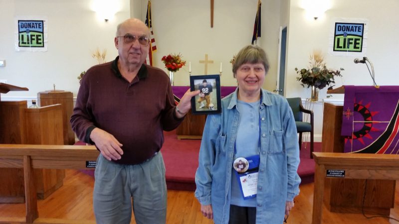 Tom and Vivian Gano display a photo of their late son, Curtis, who was an organ donor.