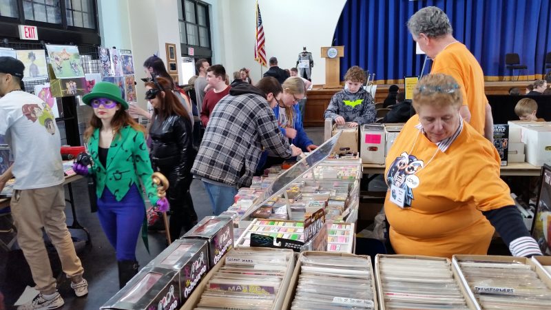 Crowds browsed through memorabilia sold by vendors on the Music Pier floor.