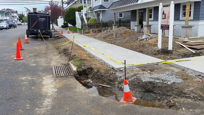 Homeowners will have 14 days to repair damaged or defaced new sidewalks, curbs or driveways.