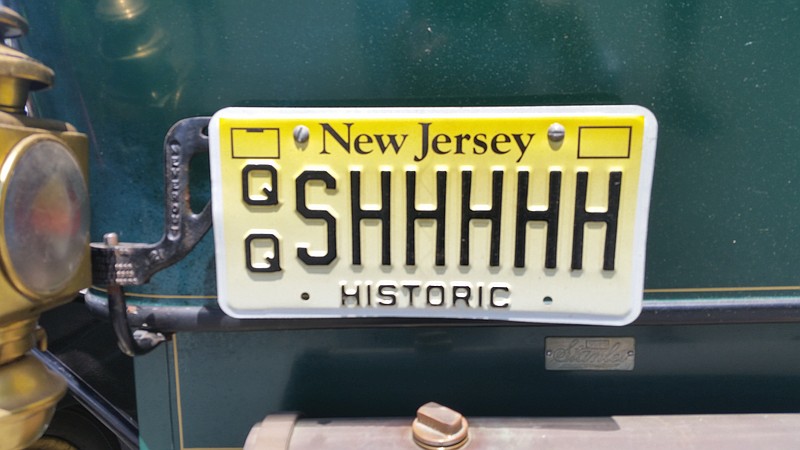 The custom license plate on Norman Schaut's 1910 Stanley Model 60 represents the sound the steam-powered car makes when it gets rolling.