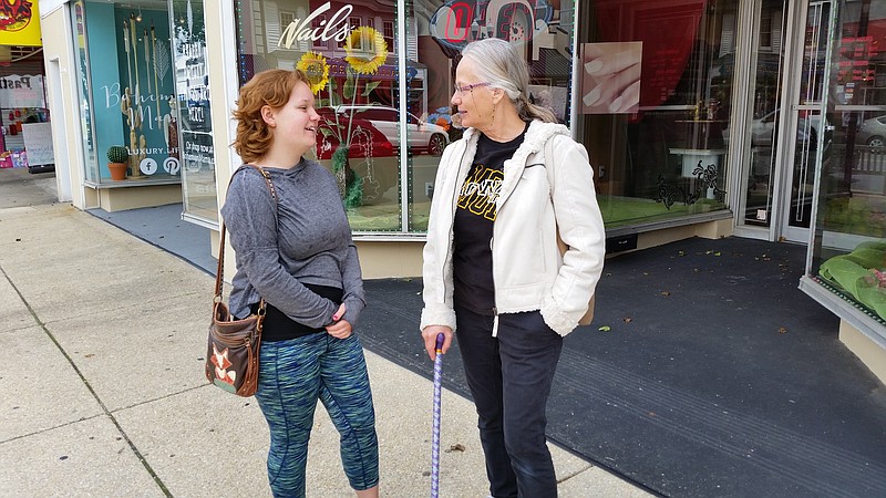 Shannon Farrell, left, and her mother, Rose Griscom, both of Ocean City, support the plan for rebuilding old sidewalks.