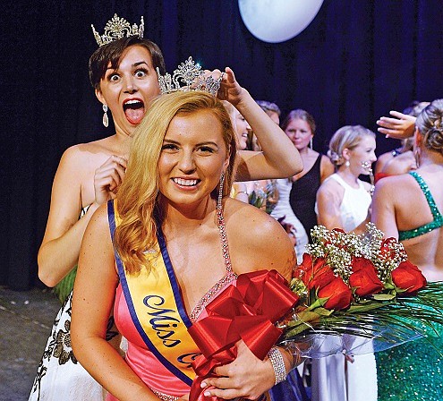 Shannon Wallace crowns her successor, McKayla Perry, at the conclusion of the Miss Ocean City Pageant in August 2016.