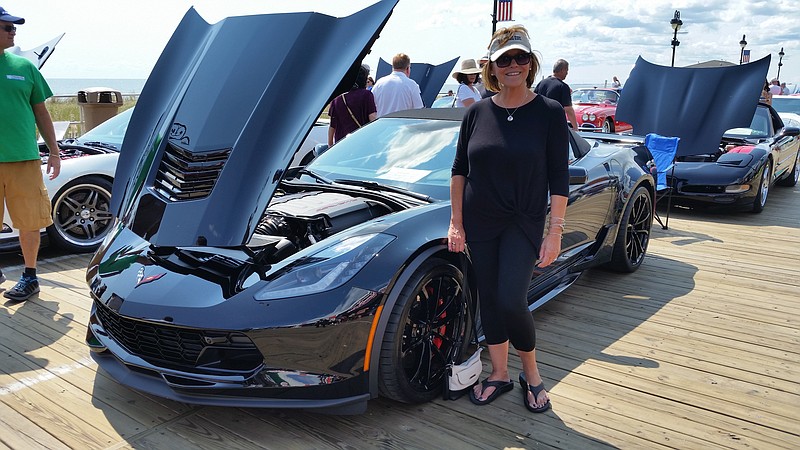 Ingrid Nestore, of Broomall, Pa., poses in front of the 2017 Corvette convertible that she owns with her husband, Frank.