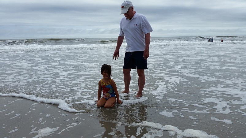 Mike Smith, of Medford, N.J., keeps an eye on his 3-year-old granddaughter, Kenzie.