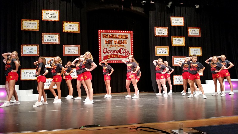 In the opening number for the pageant, the contestants perform a dance routine to the song "Fame."