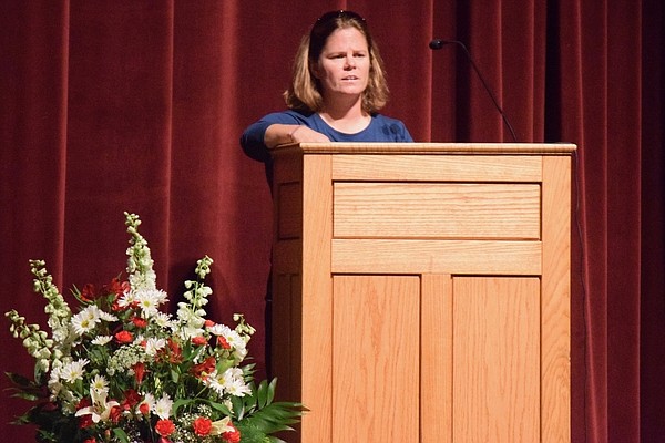 Accepting her induction into the sports hall of fame, Jen Blizzard makes jokes and gets emotional when speaking.