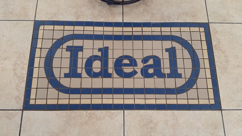 The Ideal logo adorns the floor in the middle of the shop.