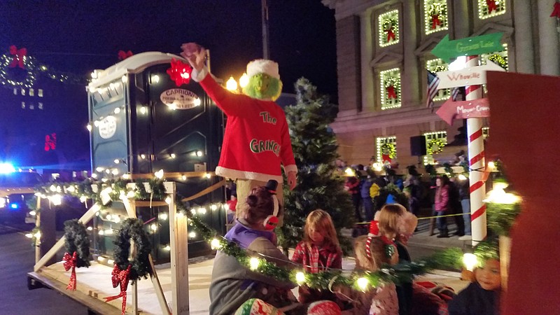 Even the Grinch was swept up in the festivities while riding on a float in the 2017 Christmas Parade. 