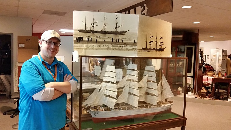 Jeff McGranahan, executive director of the Ocean City Historical Museum, stands next to a model of the Sindia that is part of a permanent exhibit about the famous shipwreck.