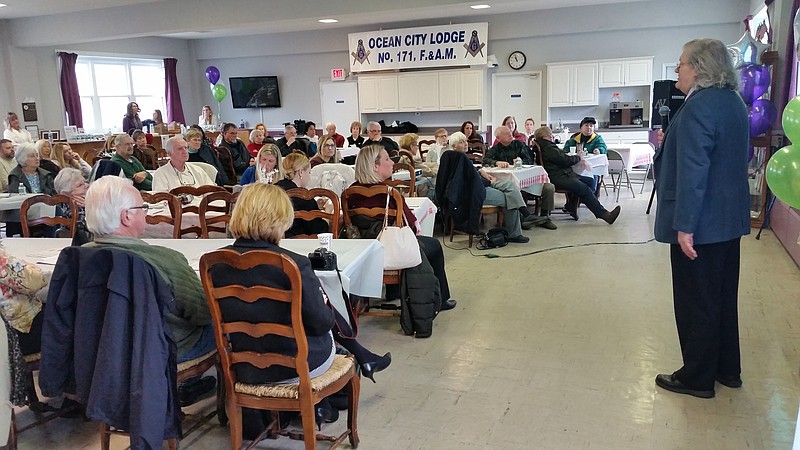 The audience listens to Dr. Roeltgen during a two-hour forum at the Ocean City Masonic Lodge No. 171 in Ocean City.