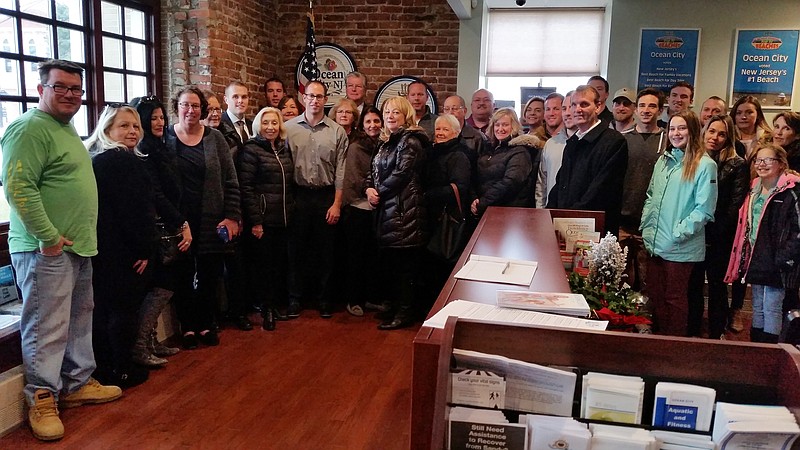 Supporters join Council members Karen Bergman and Peter Madden at City Hall for their re-election announcement.