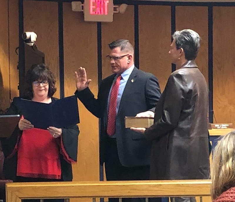 Incumbent Somers Point Councilman James Toto is sworn in to office in January, while his wife Beverly, holds the Bible and City Clerk Lucy Samuelson administers the oath of office.