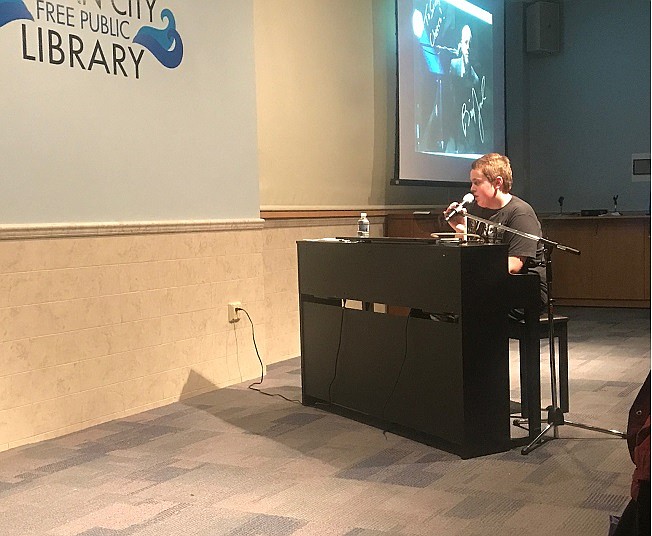 Scott Nuss is pictured as he begins to play "Piano Man" by Billy Joel.