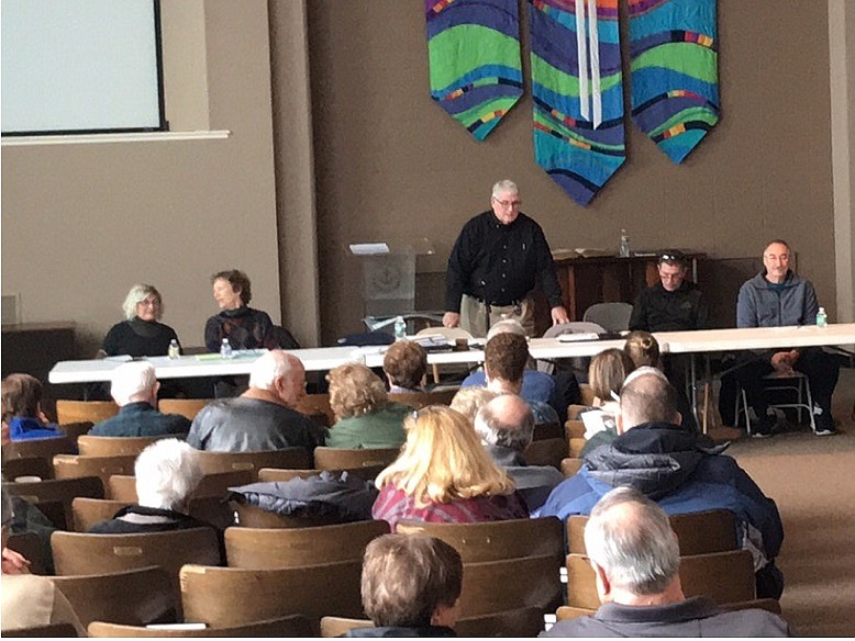 About 80 condo owners met Saturday at the Ocean City Tabernacle to discuss their options following their displacement from the building since a January 9 standpipe failure which caused water damage to the building and dozens of individual units.  From left are board members Joyce Coffman and Pam Perry, Board President William Drayton, Public Adjuster Ken Weber, and Board member Vic Staniec.