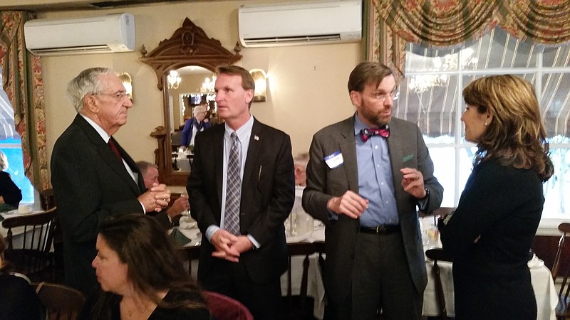 From left, Bill Hughes talks with Ocean City Mayor Jay Gillian, while Bill Hughes Jr. speaks with Michele Gillian.