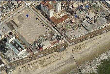 An aerial photo included with the LoopNet sales listing shows the location of the proposed development site.