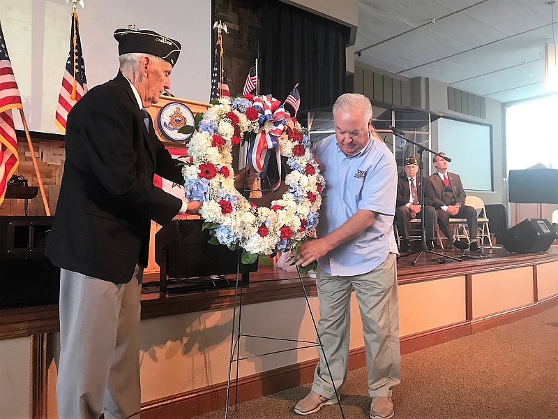 Bob Buker, Vice Commander for American Legion Post 524 and George Armstrong of VFW Post 6650, presented the wreath.