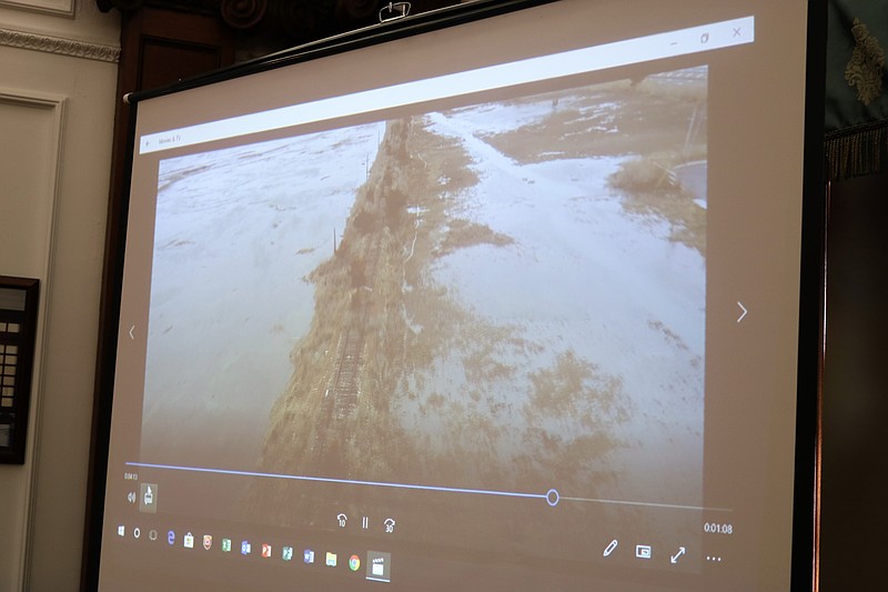 A video presentation shows erosion along Shooting Island.