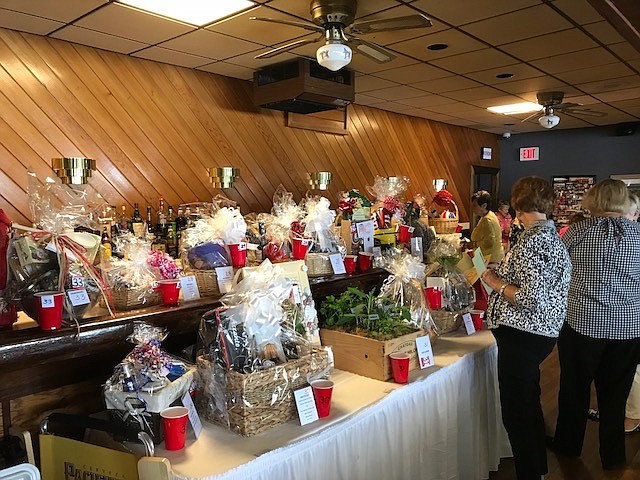 Gift baskets were auctioned off at the Deauville Inn during a June 4 fundraiser benefiting CARA. (Courtesy Monday Mahjong Madness)