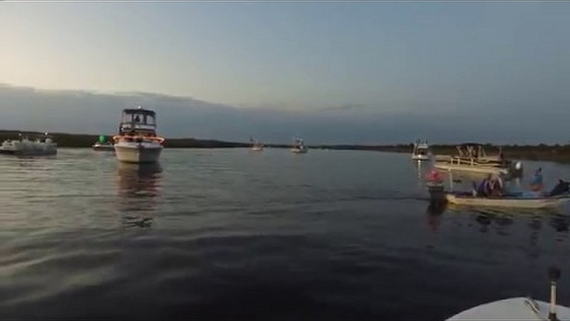 The "Night of Lights" boat parade in Mays Landing also features decorated homes along the Great Egg Harbor River. (Courtesy Mays Landing Yacht Club)