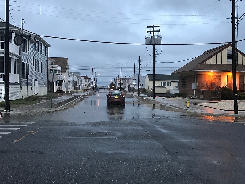 A car was stuck in recent flooding on Third Street.