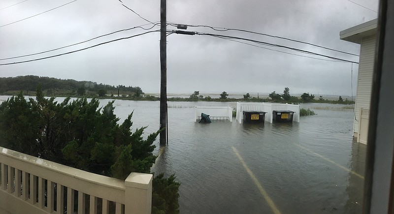 Floodwaters swamp the parking lot behind the Ocean Aire condos. (Courtesy of Steve Sinibaldi)