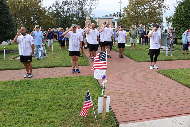 Soldiers salute six men who died while serving their country, in a heartfelt tribute at Veterans Memorial Park in Ocean City, one of several stops they made for the annual New Jersey Run for the Fallen.