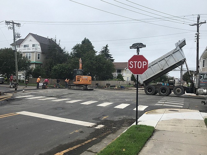 Workers connect the 600 block of 3rd Street into the drainage solution.