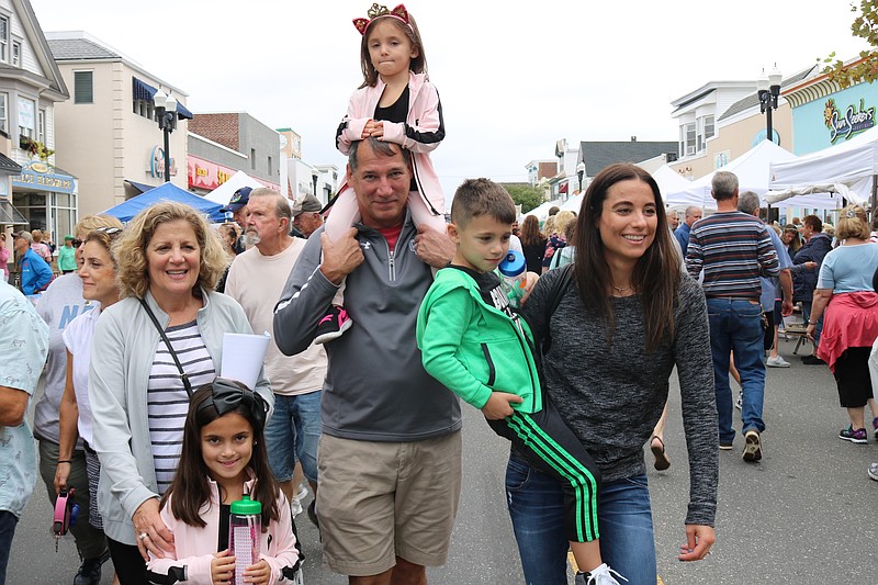 The Ross family enjoys the Fall Block Party in 2018.