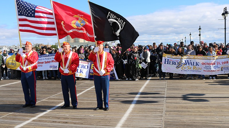 The Color Guard leads the procession for the start of the HERO Campaign walk in 2018.