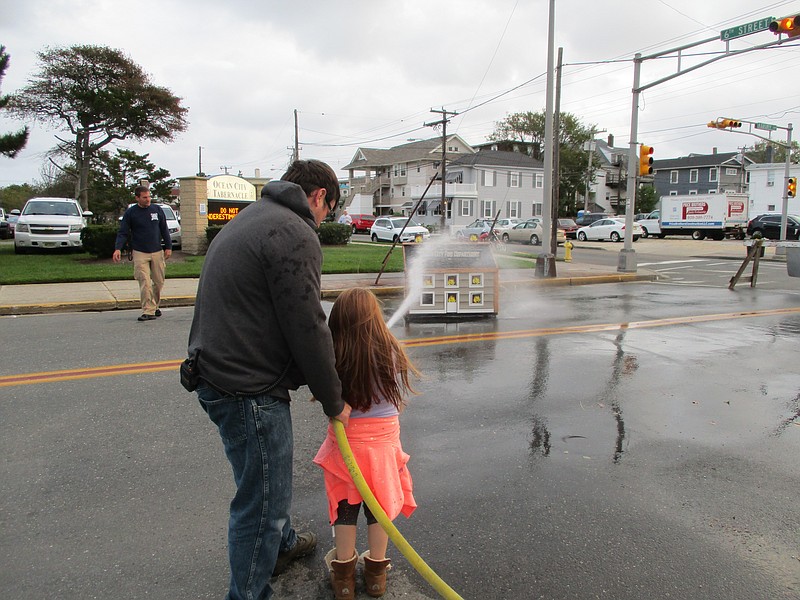 Firefighters will let kids try out the fire hose on "smoke houses." (Courtesy City of Ocean City) 