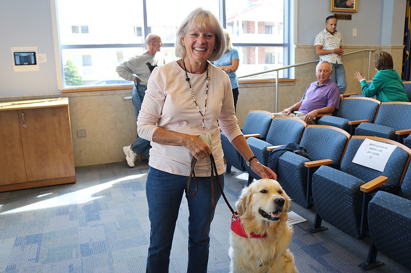 Jacquie St. John with therapy dog, Wesley, during a break.