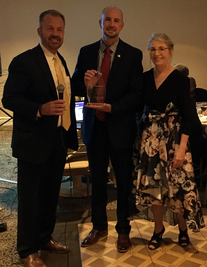 The Creating Experiences Gala honoree, Frank Donato, III, Ocean City’s director of finance and coordinator of the Office of Emergency Management accepts recognition, flanked by United Methodist Communities President and CEO, Larry Carlson (left) and Vice President of Operations, Carol McKinley. (photo courtesy UMC) 