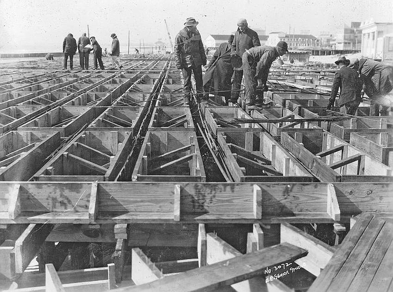 Construction crews race to install a new section of the Boardwalk to get it ready for the 1928 summer tourism season. (Courtesy Bloximages)