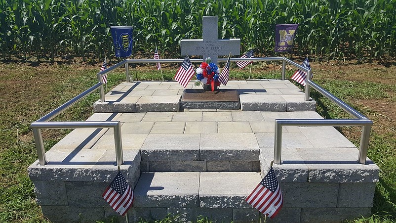 A roadside memorial marks where Ensign John Elliott was killed by a drunken driver in Pittsgrove, Salem County. (Photo courtesy of the HERO Campaign)