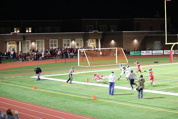 Brendan Lashley dives across the goal line for Ocean City’s second TD.