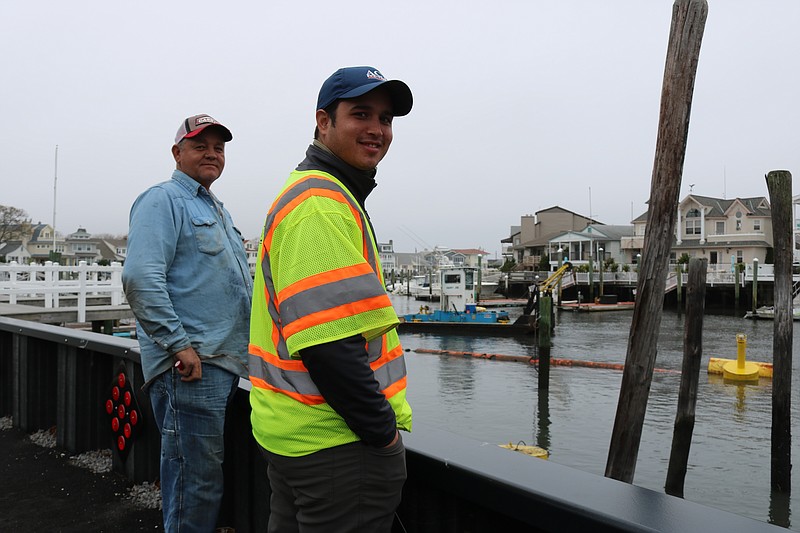 ACT Engineers inspector Juan Cruz watches the work crews with Southwind Construction manager Mike Will.