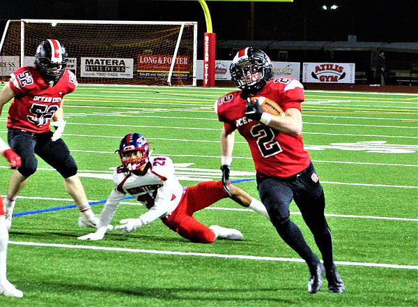 Brandon Pokrass breaks into the open field to gain yardage last week against Washington Township.