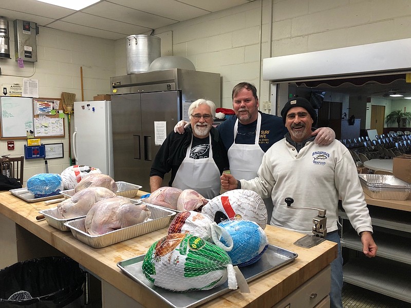 Volunteers on Saturday cooked many turkeys. (Submitted)