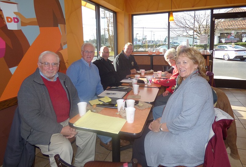 Cape May County Freeholders Marie Hayes, right, and Jeffrey Pierson, in blue sweater, talk with some of the residents who showed up for the first County Coffee Chat on Dec. 10 at the Dunkin Donuts in Marmora. (Photo courtesy of Cape May County)