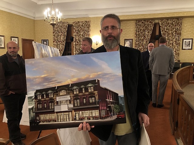 Architect Daniel Scott Mascione shows the artists rendering for the Ventnor Square Theater.