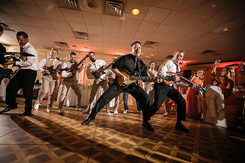 Entertainer Kenny I (front and center in black) will be hosting the Princess and Superheroes Party at the Flanders Hotel on Feb. 17. (Photo credit Kenny i Entertainment)