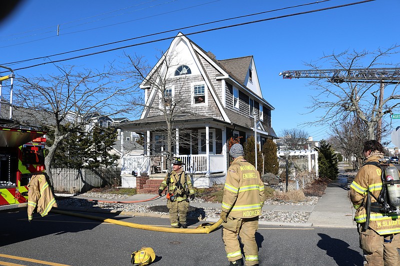 Firefighters secure the scene.