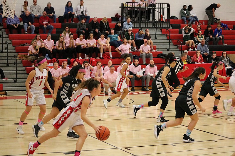 Red Raider Savanna Holt dribbles the ball up court.