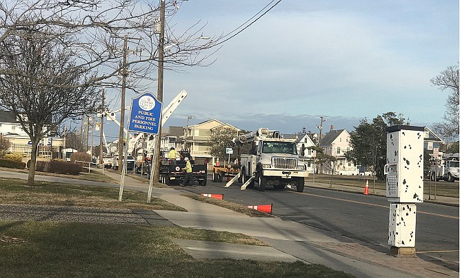 Atlantic City Electric crews are pictured working on the lines at 5th Street and Asbury Avenue as part of the service upgrades.